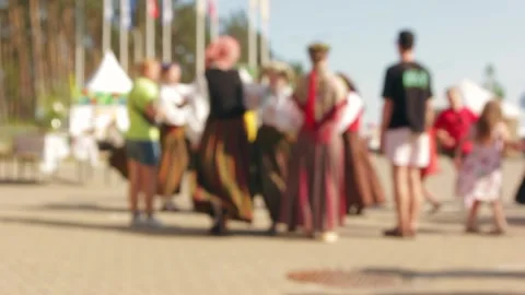 Mixed-age troupe performs folk round on promenade Stock Footage 311642380