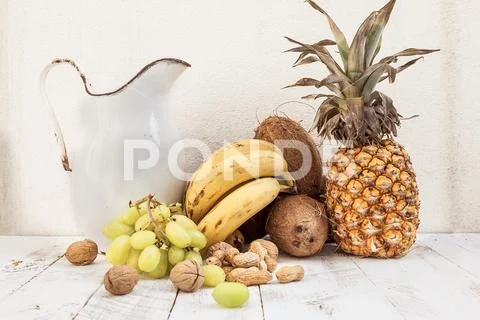 Mixed with autumn fruits and a pitcher Stock Photos