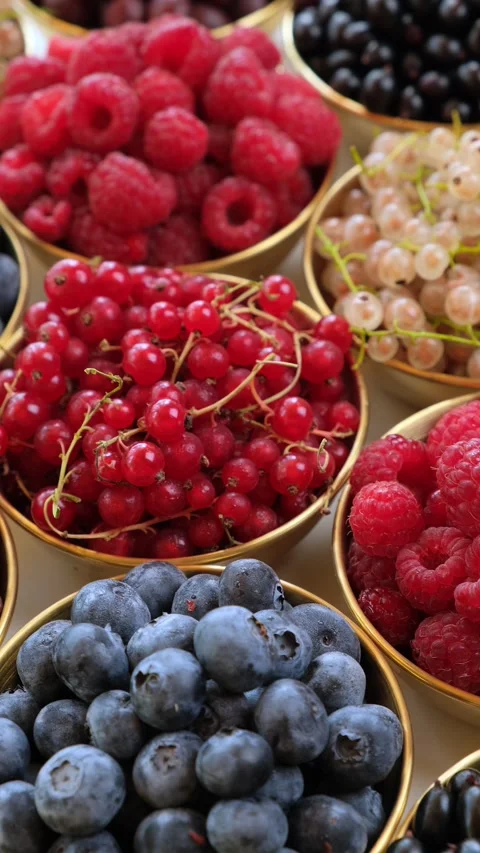 Mixed Berries In Bowls Flat Lay Rotating Vertical Video 스톡 동영상 344992551