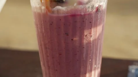 Mixed berries milkshake with mint Stock Footage 300691211