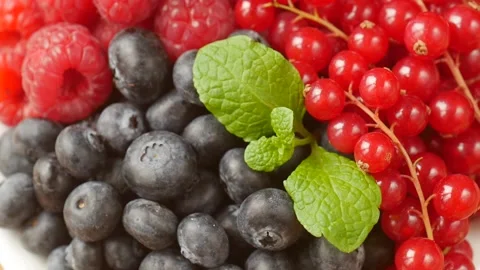 Mixed berries on a plate. Stock Footage 224930409