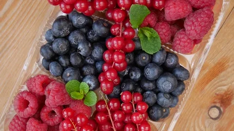 Mixed berries on a plate. Stock Footage 243877385