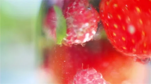 Mixed berries in water Stockbeeldmateriaal 57799990
