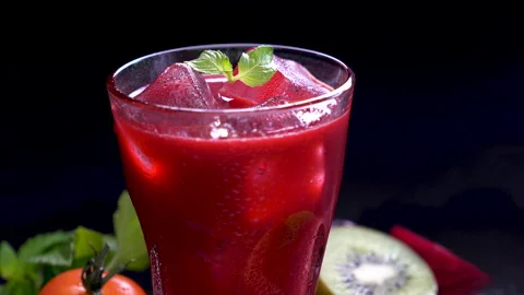 Mixed berry and beetroot juice with surrounding fruits Video stock 142256709