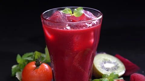 Mixed berry and beetroot juice with surrounding fruits Stock Footage 142495097
