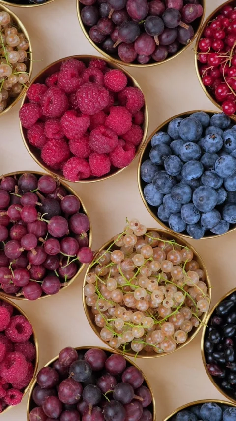 Mixed Berry Bowls Rotating Vertical Video 스톡 동영상 345087019