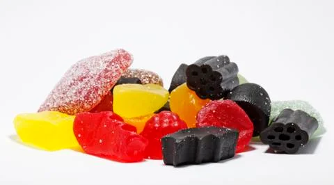Mixed candy with sugar on white background in studio light Stock Photos