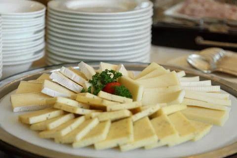 Mixed cheese slices in a buffet Stock Photos
