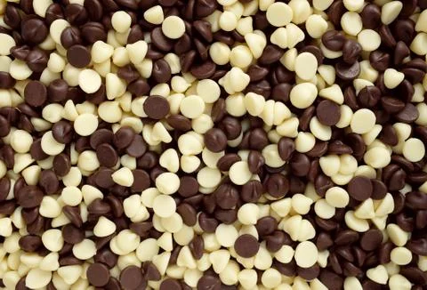 Mixed chocolate chips background Stock Photos