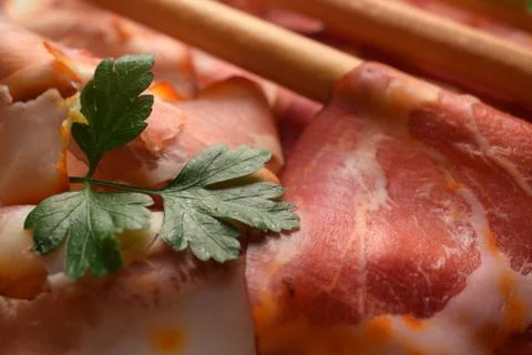 Mixed cold cuts with breadsticks Stock Photos