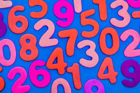 Mixed coloured numbers on a blue background. Stock Illustration
