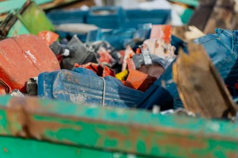 Mixed construction waste with damaged toolboxes Stock Photos