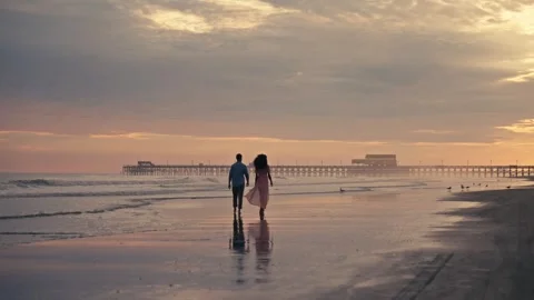 Mixed Diverse Couple Walks On Beach during Sunset East Coast Florida Carolina Видео 280508455
