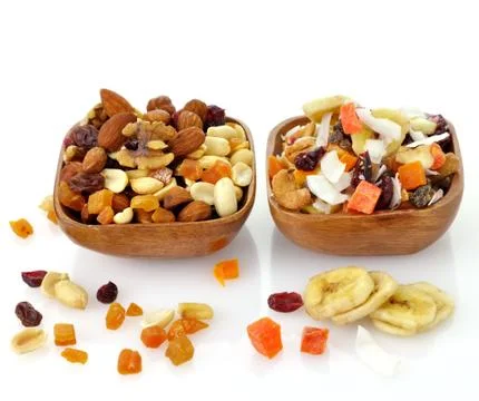 Mixed dried fruit, nuts and seeds Stock Photos