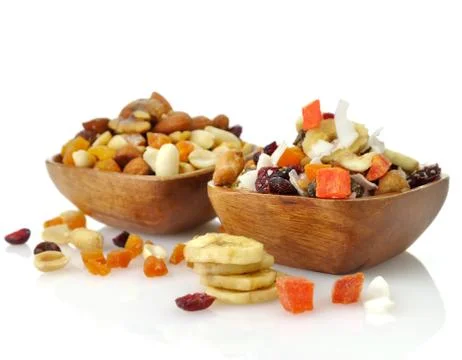 Mixed dried fruit, nuts and seeds Stock Photos