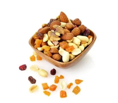 Mixed dried fruit, nuts and seeds Stock Photos