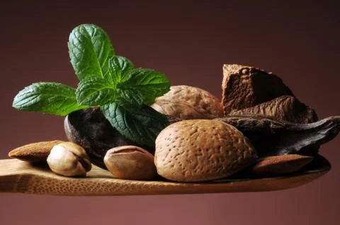 Mixed dried fruit on spoon Stock Photos