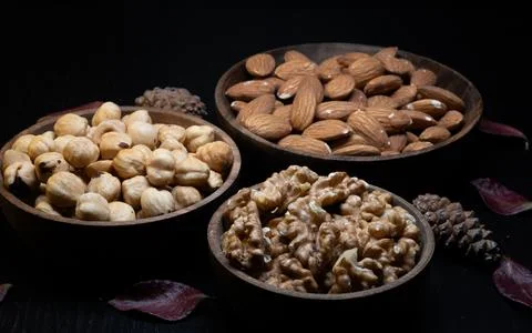 Mixed dried fruit: walnuts, hazelnuts and almonds Stock Photos