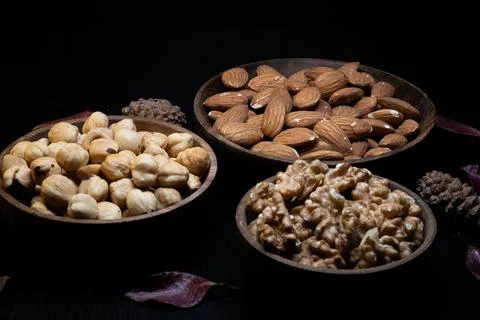 Mixed dried fruit: walnuts, hazelnuts and almonds Stock Photos