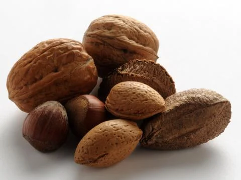 Mixed dried fruit on white background Stock Photos