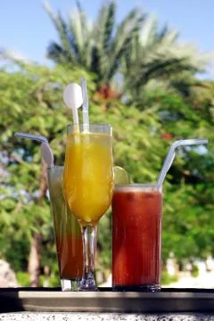 Mixed drink with exotic background Stock Photos