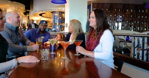 Mixed ethnicity group dining at seafood restaurant with child Vídeo Stock 88239405