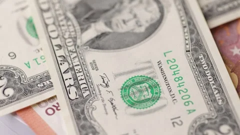 Mixed euro and dollar banknotes rotating in layered macro composition seaml.. Stock Footage 323975273