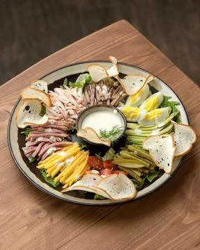 Mixed festive slicing on Platter. Assorted of meat, ham, cheese and cutting Stock Photos