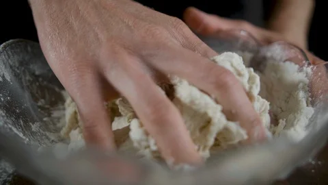 Mixed flour and dough for baking cake in the isolated dark kitchen background Stock-Footage 113514622