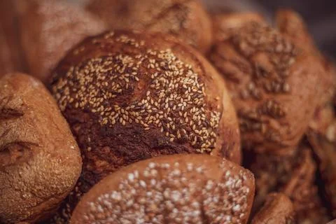 Mixed fresh bread and buns closeup. gluten-free pastries Stock Photos