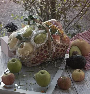 MIxed fruit basket put on background Foto stock