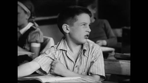 Mixed Gender Elementary School Classroom During Lesson Stock Footage 157788684
