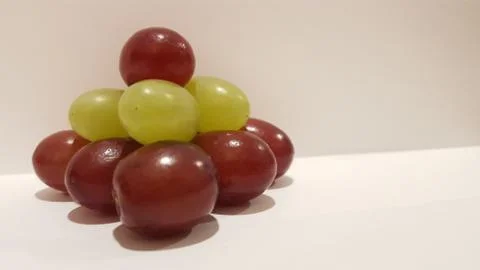 Mixed Grapes Stacked Into a Pyramid Stock Photos