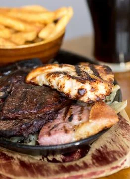 Mixed grill with chips Stock Photos