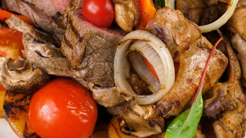 Mixed grilled meat platter, close-up view Stock Footage 87568827