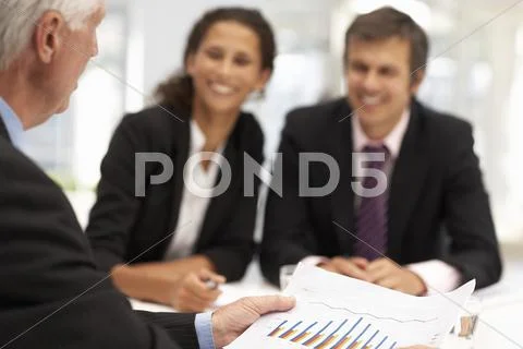 Mixed group in business meeting Stock-Fotos