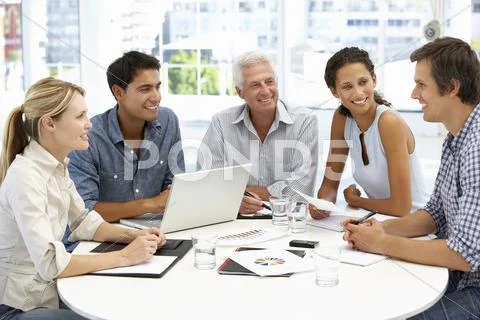 Mixed group in business meeting Stock Photos