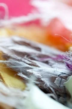 Mixed mess of fabrics Stock Photos