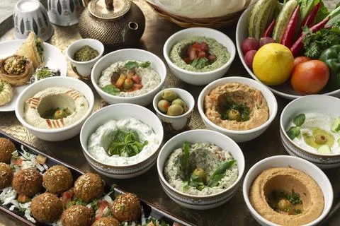 Mixed middle eastern meze sharing food platter in turkish restaurant Stock Photos