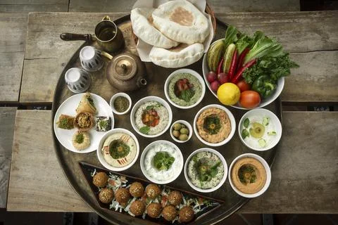 Mixed middle eastern meze sharing food platter in turkish restaurant Stock Photos