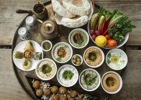Mixed middle eastern meze sharing food platter in turkish restaurant Stock Photos
