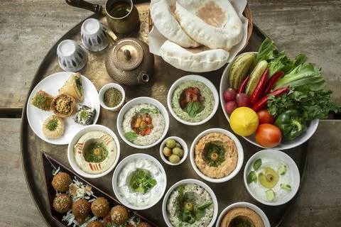Mixed middle eastern meze sharing food platter in turkish restaurant Stock Photos