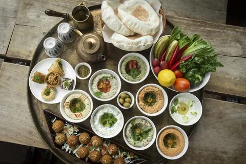 Mixed middle eastern meze sharing food platter in turkish restaurant Stock Photos