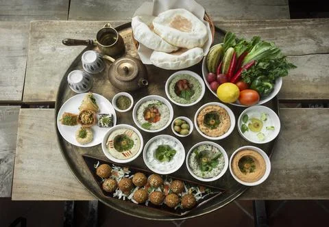 Mixed middle eastern meze sharing food platter in turkish restaurant Stock Photos