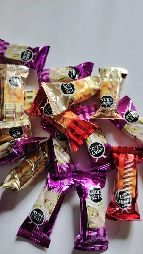 Mixed Mini Chocolate Bars Pile Top View Variety of Chocolate Treats Stock Footage 329094999