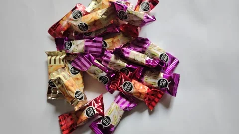 Mixed Mini Chocolate Bars Pile Top View Variety of Chocolate Treats Stock Footage 329095030