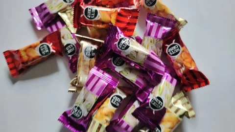 Mixed Mini Chocolate Bars Pile Top View Variety of Chocolate Treats Stock Footage 329095042