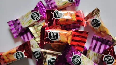 Mixed Mini Chocolate Bars Pile Top View Variety of Chocolate Treats Stock Footage 329095043