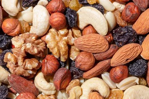 Mixed Nuts: Almonds, Walnuts, Cashews, Peanuts, Hazelnuts, Dried Prunes and R Stock Photos