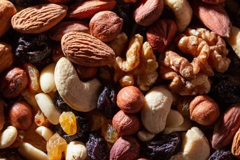 Mixed Nuts: Almonds, Walnuts, Cashews, Peanuts, Hazelnuts, Dried Prunes and R Stock Photos